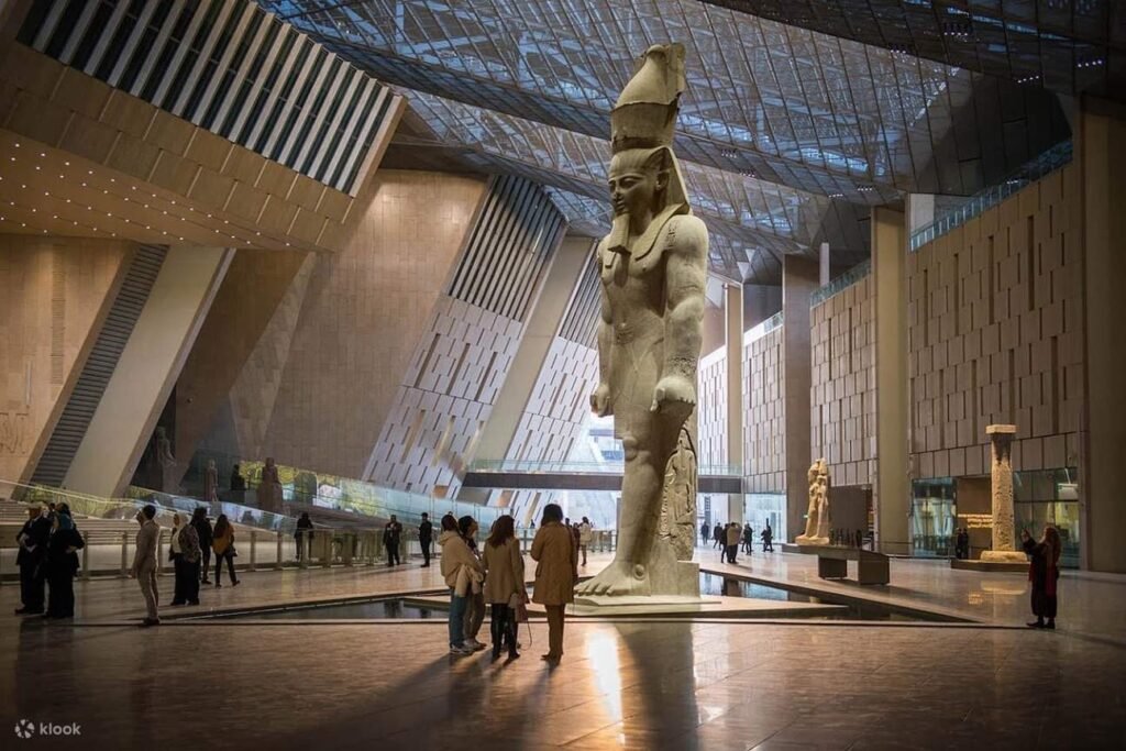 The Grand Egyptian Museum Welcomes Visitors After a Long Build 2 Grand Egyptian Museum interior with Ramses II statue